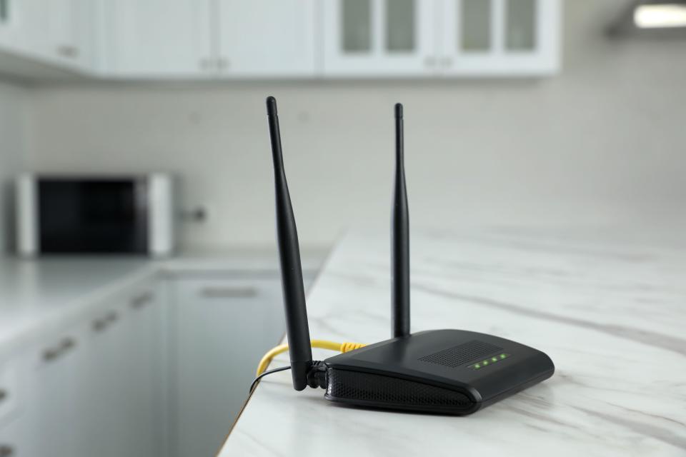 Wi-Fi router on a kitchen counter.