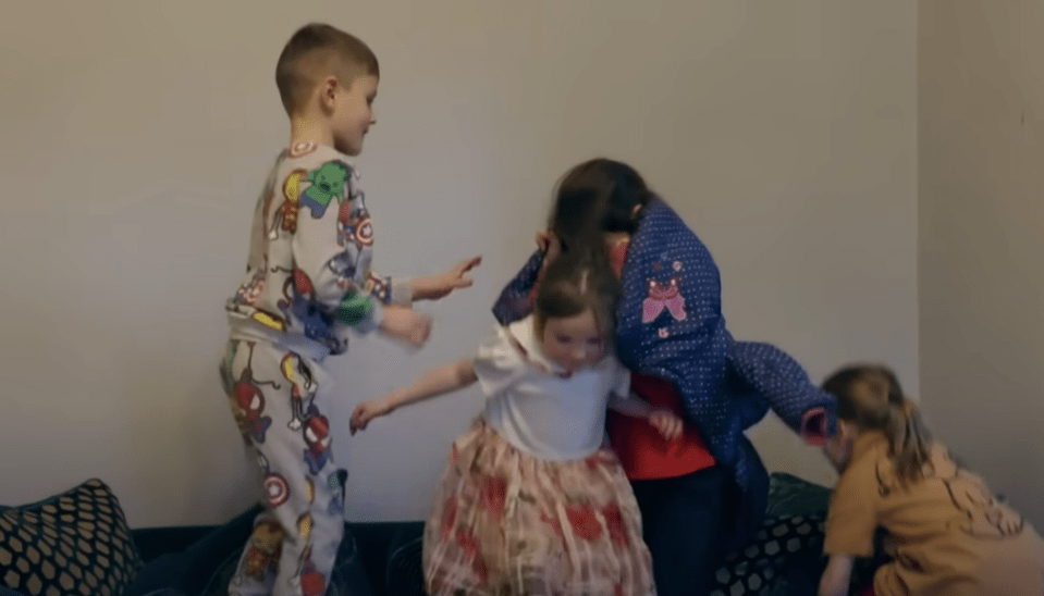 Four children playing together.