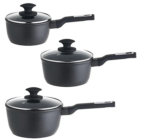 Three dark gray saucepans with glass lids.