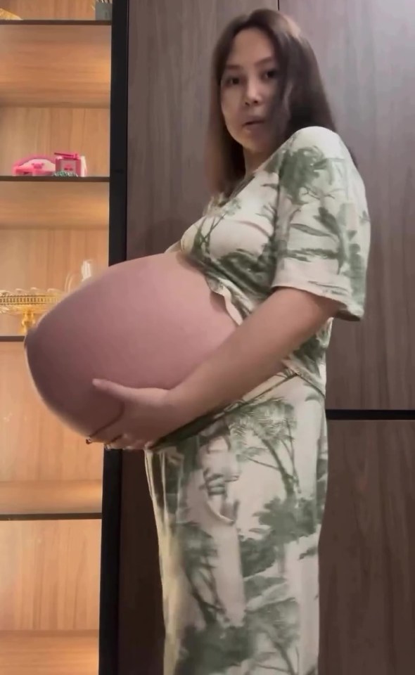 A woman left people stunned as she took to the Internet to show off her giant baby bump