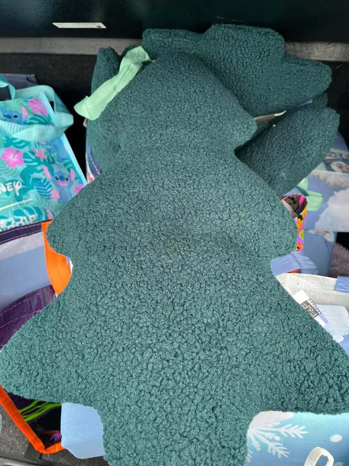 Dark teal tree-shaped plush toy.