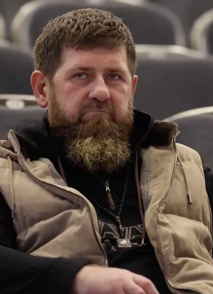 Ramzan Kadyrov seated and looking at the camera.