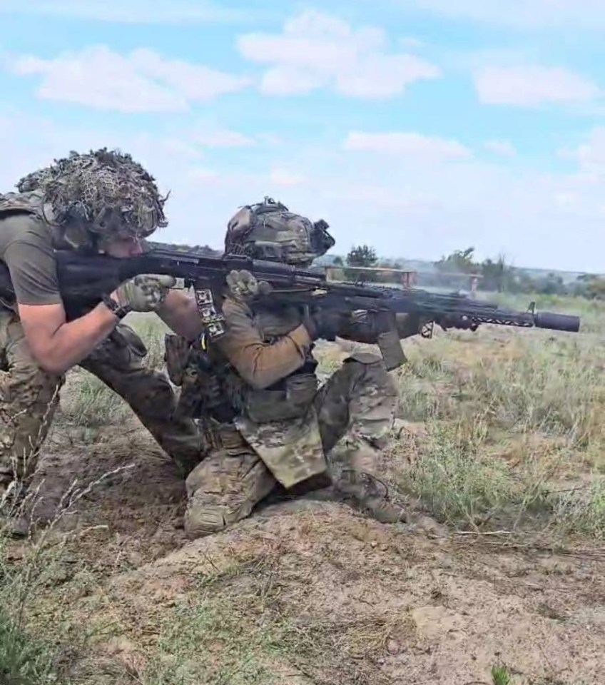 Ukrainian army snipers moving near Bakhmut.