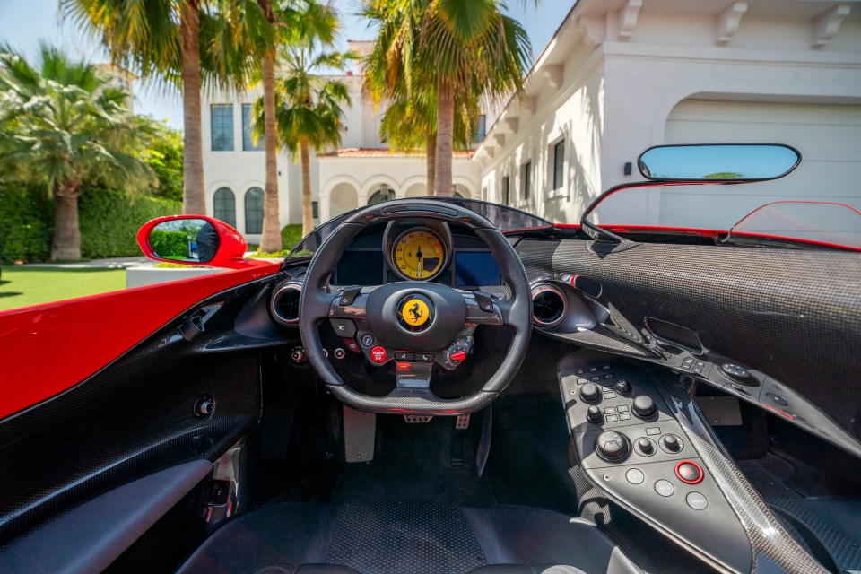 Interior view of a red Ferrari Monza SP2.