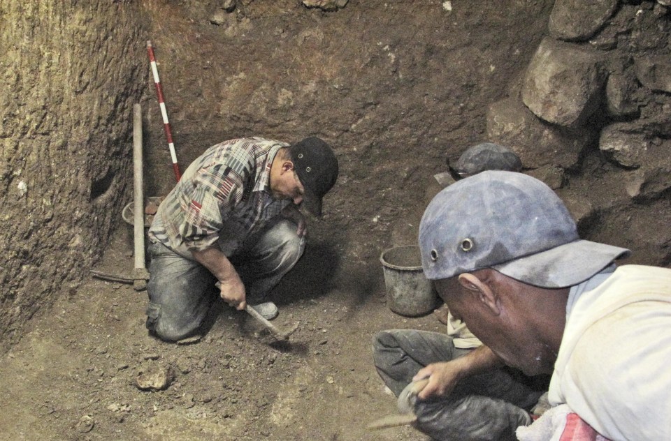 Archaeologists excavating a 3,000-year-old shrine in Jerusalem.