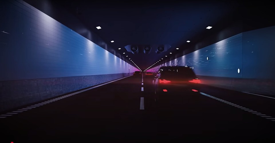 Cars driving through an underwater tunnel.