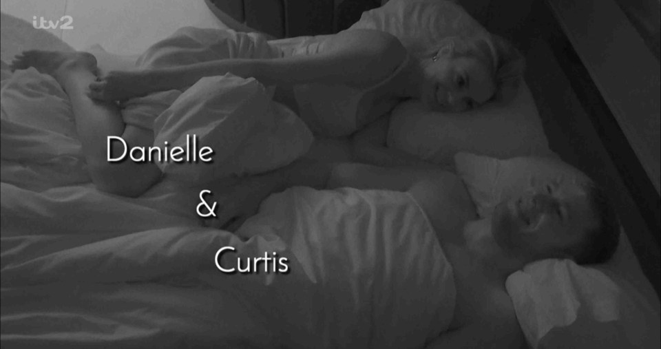 Danielle and Curtis in bed.