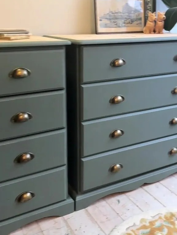 Two green painted chests of drawers.