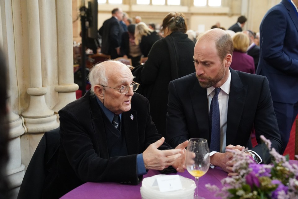 Prince William speaking with a Holocaust survivor at a Holocaust Memorial Day ceremony.