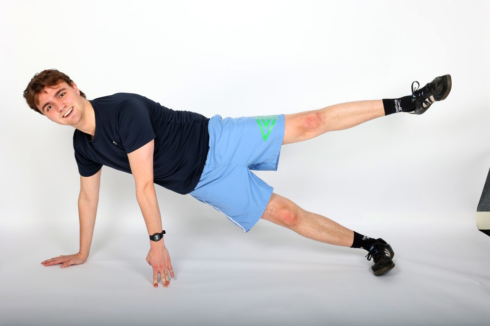 Slowly raise your left leg up to a 45-degree angle, then lower it