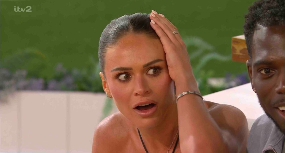 Screenshot of Love Island All Stars showing India Reynolds reacting in surprise.