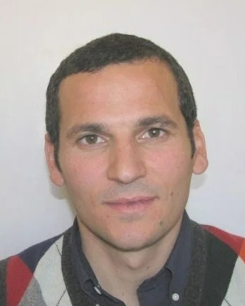 Interpol Red Notice for Rexhep Dritan, wanted for cocaine trafficking.