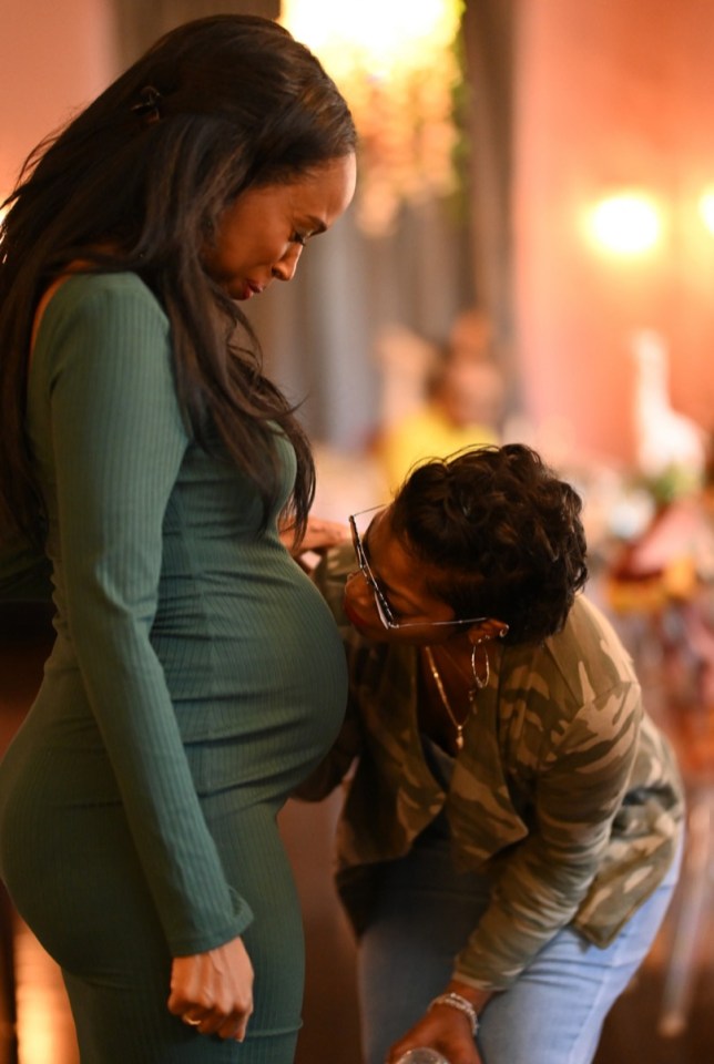 Kia with a friend during her pregnancy journy