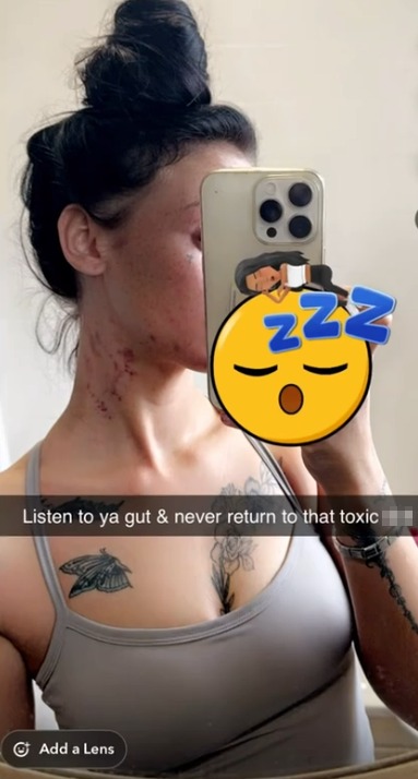 Woman taking a selfie with a sleeping emoji overlay.