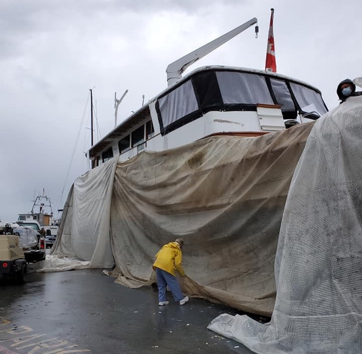 All the paint from the hull was blasted off by hand