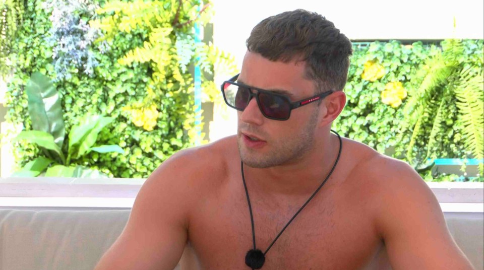 Curtis Pritchard from Love Island wearing sunglasses.