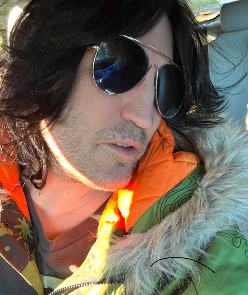 Close-up of Noel Fielding wearing sunglasses and a jacket.