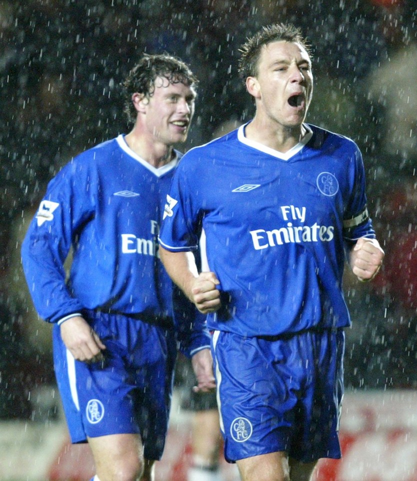 John Terry and Wayne Bridge celebrating a Chelsea victory.