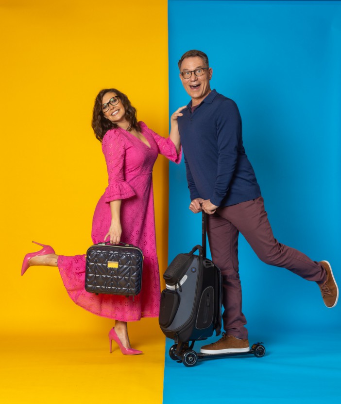 Kym Marsh and a male co-host promoting a new travel show.