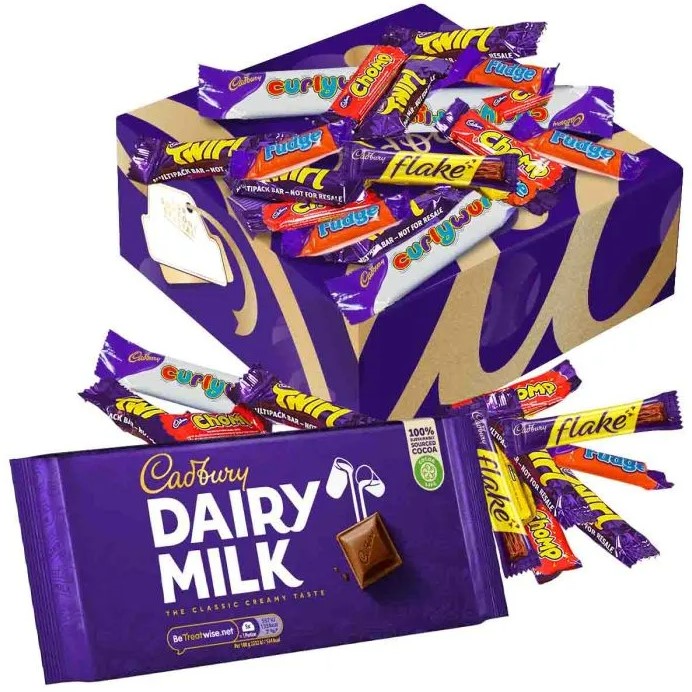 Cadbury chocolate box with assorted chocolate bars and a Cadbury Dairy Milk bar.