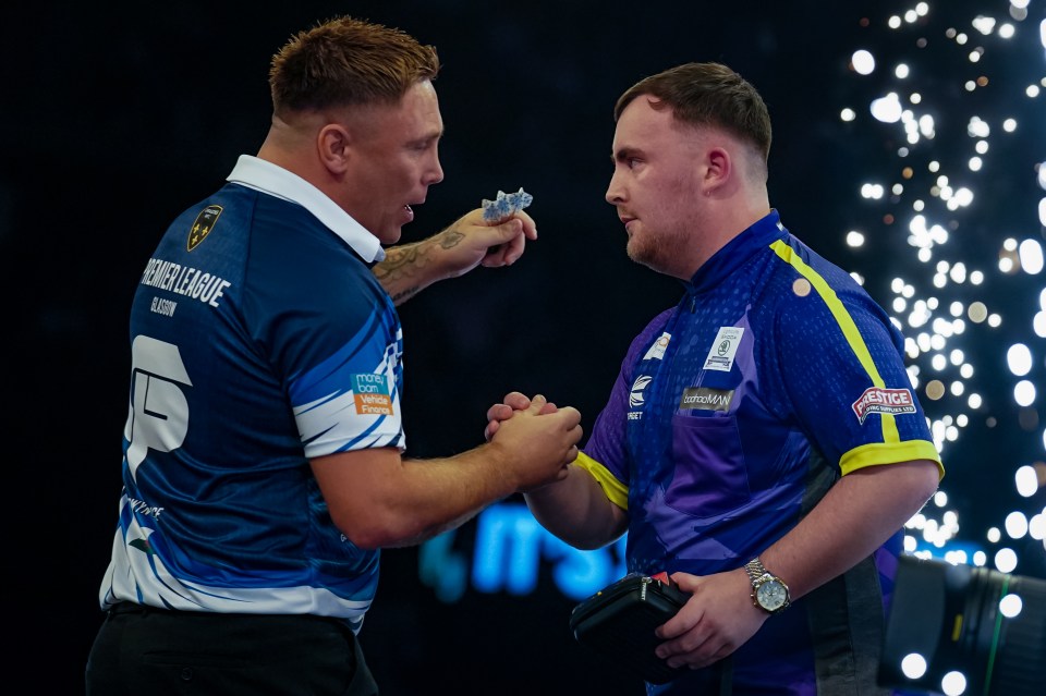 Gerwyn Price and Luke Littler shake hands during night three of the 2024 BetMGM Premier League at the OVO Hydro, Glasgow. Picture date: Thursday February 15, 2024. PA Photo. See PA story DARTS Glasgow. Photo credit should read: Andrew Milligan/PA Wire. RESTRICTIONS: Use subject to restrictions. Editorial use only, no commercial use without prior consent from rights holder.