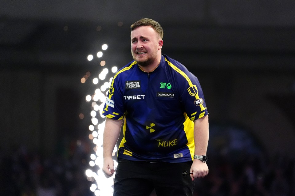 Luke Littler celebrates winning the Paddy Power World Darts Championship final against Michael van Gerwen (not pictured) at Alexandra Palace, London. Picture date: Friday January 3, 2025. PA Photo. See PA story DARTS World. Photo credit should read: Zac Goodwin/PA Wire. RESTRICTIONS: Use subject to restrictions. Editorial use only, no commercial use without prior consent from rights holder.