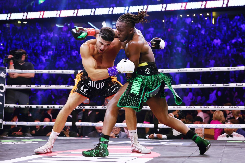 MANCHESTER, ENGLAND - OCTOBER 14: KSI (Olajide Olayinka Williams) and Tommy Fury exchange punches during the Misfits Cruiserweight fight between KSI (Olajide Olayinka Williams) and Tommy Fury at AO Arena on October 14, 2023 in Manchester, England. (Photo by Matt McNulty/Getty Images)