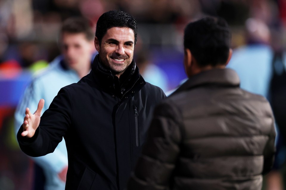 GIRONA, SPAIN - JANUARY 29: Mikel Arteta, Manager of Arsenal, and Michel, Head Coach of Girona FC, interact prior to the UEFA Champions League 2024/25 League Phase MD8 match between Girona FC and Arsenal FC at Montilivi Stadium on January 29, 2025 in Girona, Spain. (Photo by Ryan Pierse/Getty Images)