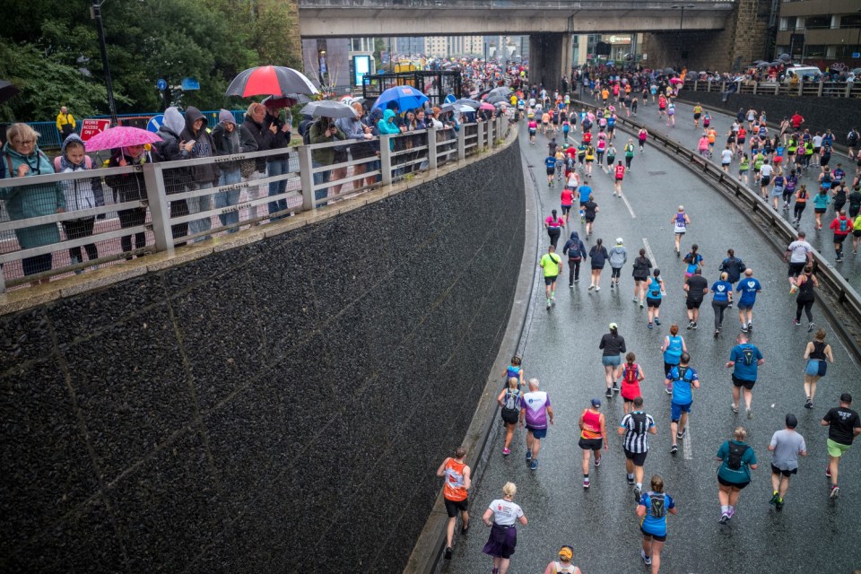 NEWCASTLE UPON TYNE, ENGLAND - SEPTEMBER 08: Runners pass through Newcastle on their way to South Shields during the AJ Bell Great North Run on September 08, 2024 in Newcastle upon Tyne, England. The AJ Bell Great North Run is the worlds biggest half marathon, attracting 60,000 runners each year to its iconic 13.1 mile route from Newcastle to South Shields. (Photo by Ian Forsyth/Getty Images)