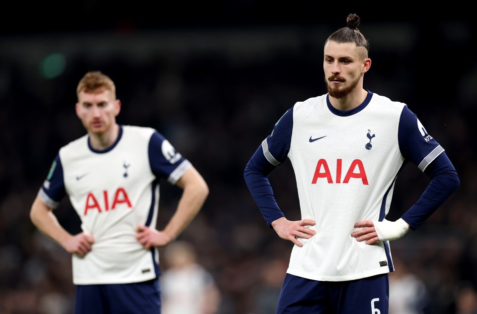 LONDON, ENGLAND - JANUARY 08: Radu Dragusin of Tottenham Hotspur appears dejected during the Carabao Cup Semi Final First Leg match between Tottenham Hotspur and Liverpool at Tottenham Hotspur Stadium on January 08, 2025 in London, England. (Photo by Julian Finney/Getty Images)