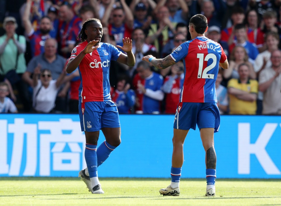 Eberechi Eze and Daniel Muñoz of Crystal Palace celebrate a goal.