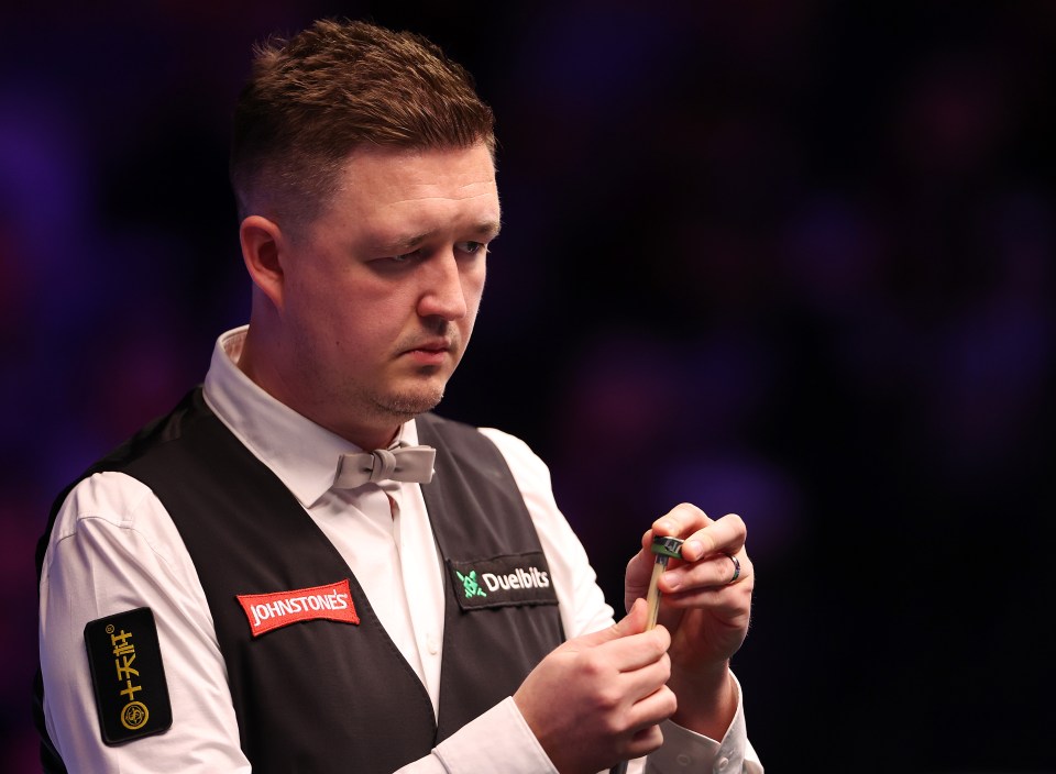 LONDON, ENGLAND - JANUARY 19: Kyren Wilson of England chalks his cue during day eight of the Johnstone's Paint Masters 2025 at Alexandra Palace on January 19, 2025 in London, England. (Photo by Harry Murphy/Getty Images)