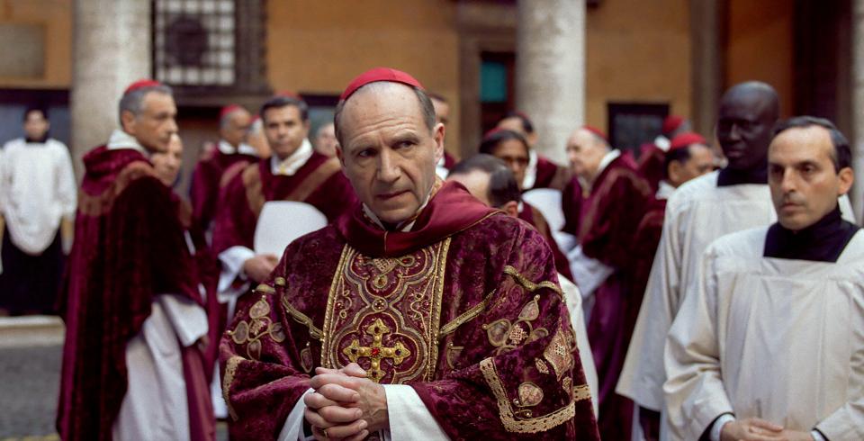 Ralph Fiennes as a cardinal in a film still.