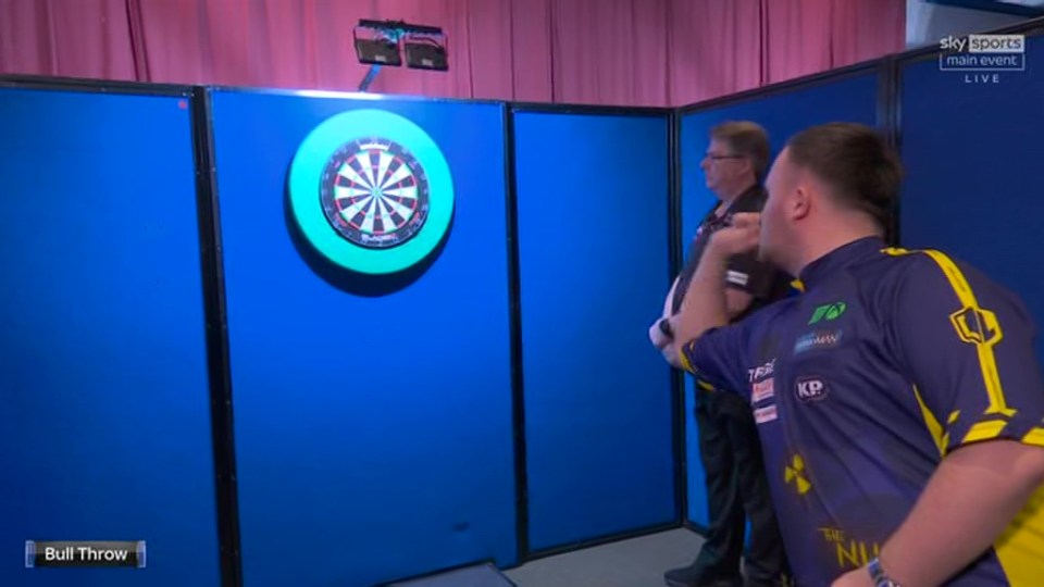 A darts player throwing a dart at a dartboard.