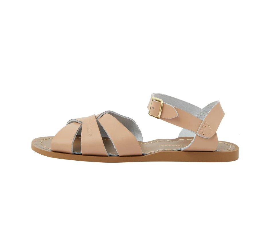 Tan leather sandal with gold buckle.