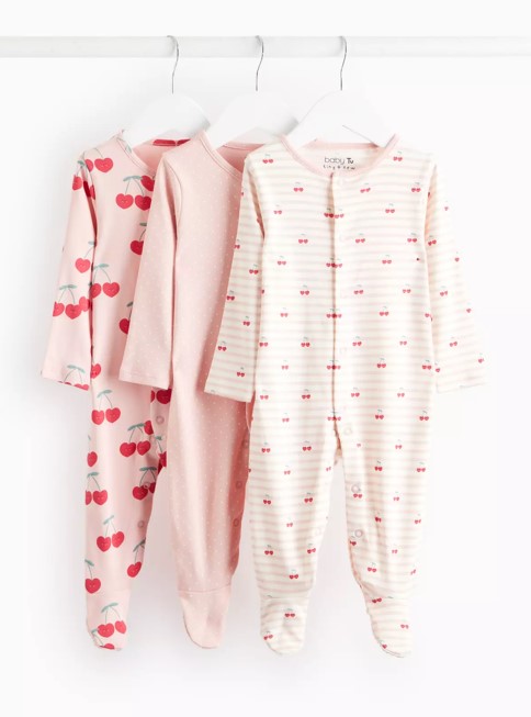 Three baby sleepers with cherry prints.