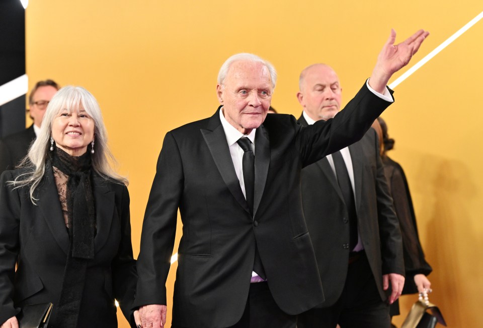 Sir Anthony Hopkins and Stella Arroyave Hopkins at an awards ceremony.