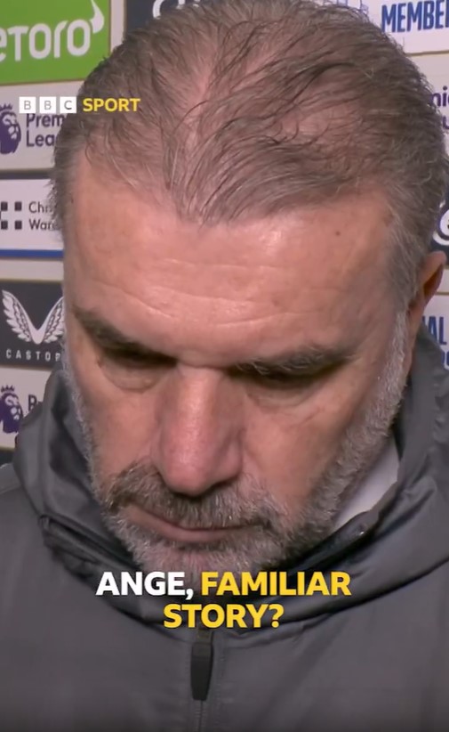 Close-up of Ange Postecoglou looking down.