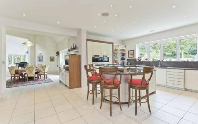 Open-plan kitchen and dining area with island seating.