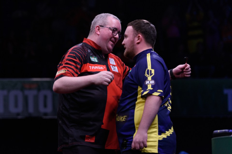 Two darts players facing each other.