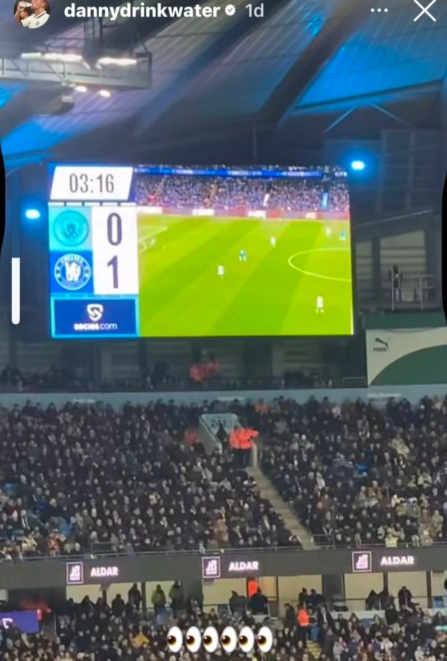 Stadium scoreboard showing a 0-1 score.