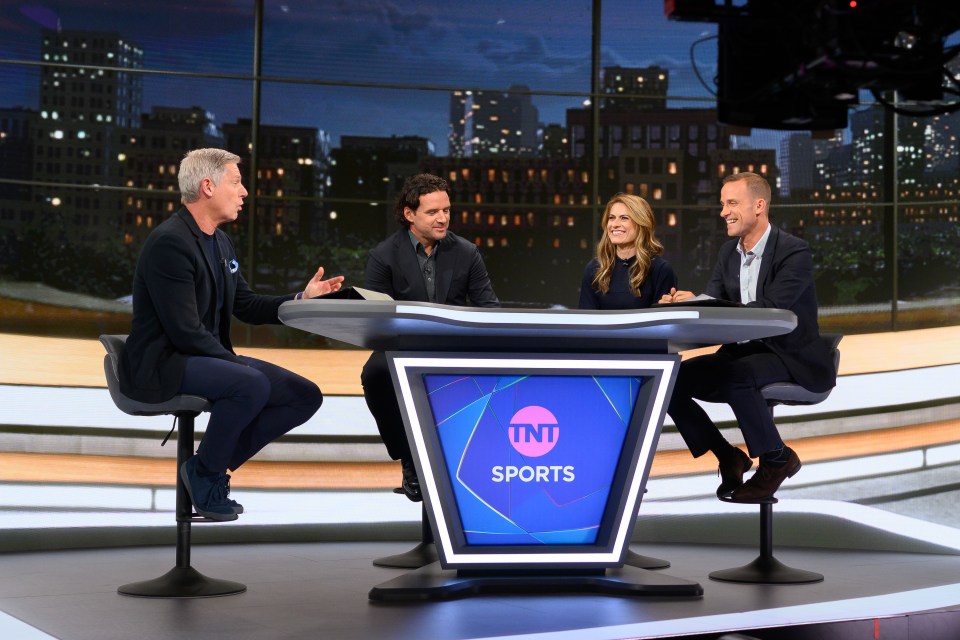 Four sportscasters sitting at a TNT Sports desk.