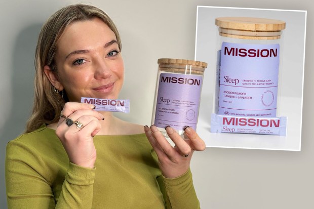 Person holding Mission Sleep Rooibos powder packets and jar.