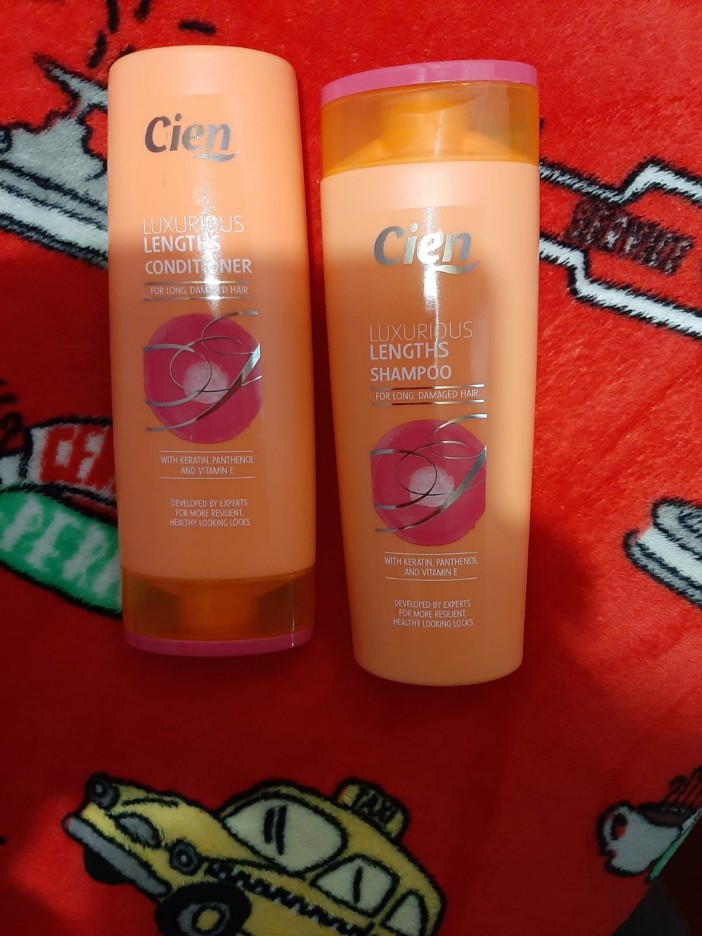 Cien Luxurious Lengths shampoo and conditioner bottles.