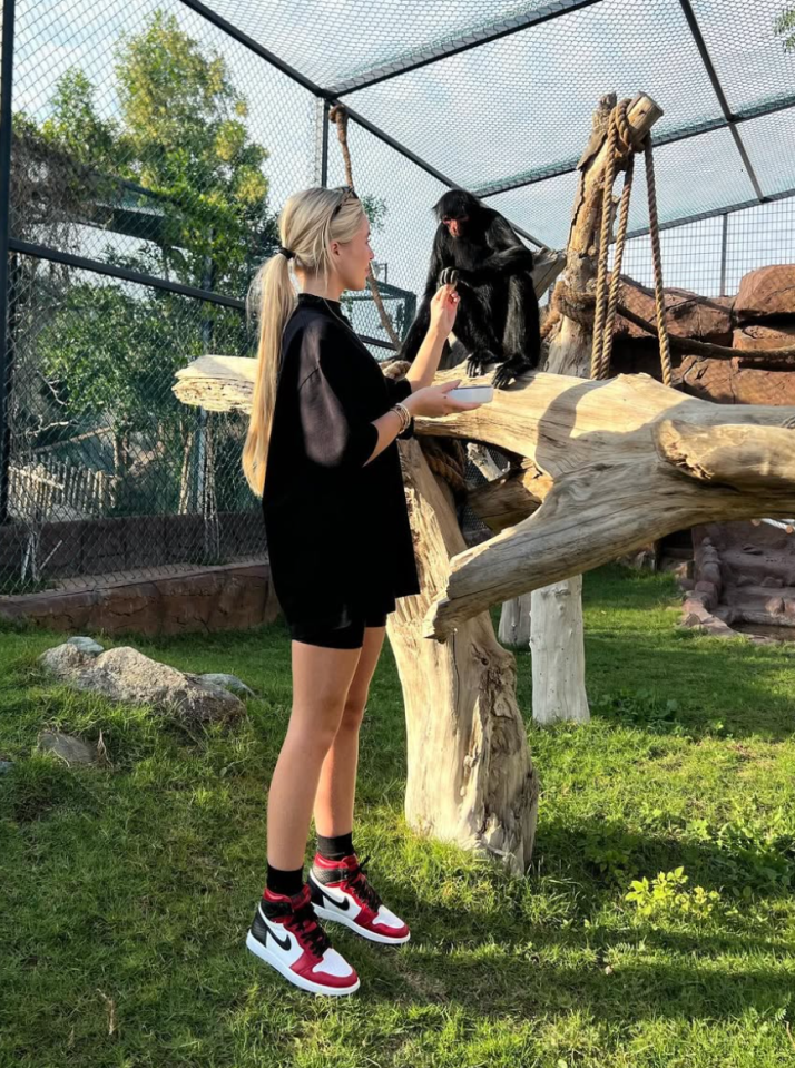 On a trip to Dubai, Lilly fed some monkeys at Fame Park zoo