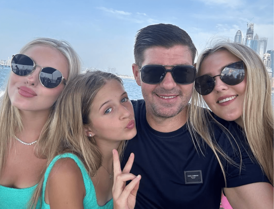 Steven Gerrard poses with his three daughters, Lilly, left, Lourdes centre, and Lexie, right