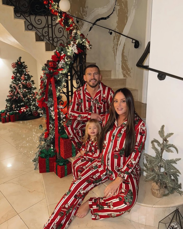 Charlotte Crosby and Jake Ankers with daughter matching christmas pjs..Last Christmas as a 3 ¿¿..We are so ready to meet you now baby girl  not long now ..//www.instagram.com/p/DD5KVPSt_V_/?hl=en