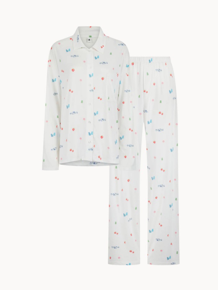 White pajama set with small colorful print.