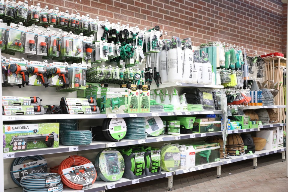 Gardening supplies on shelves.