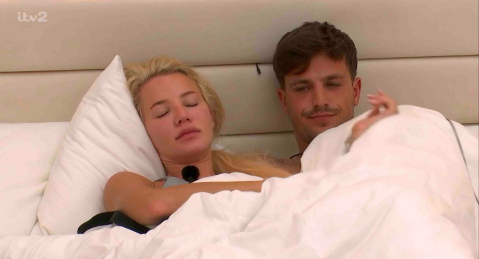 Grace Jackson and Luca Bish in bed together.